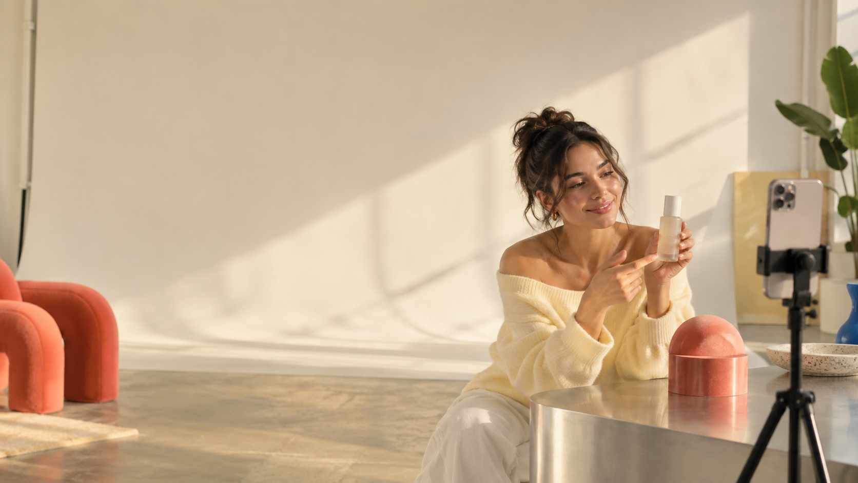 Creator filming a product in a warm studio